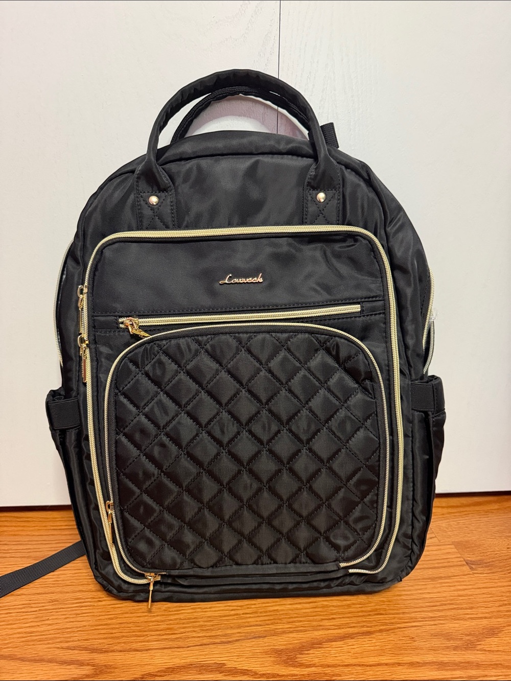 Lovevook Quilted Black Backpack with Gold Accents